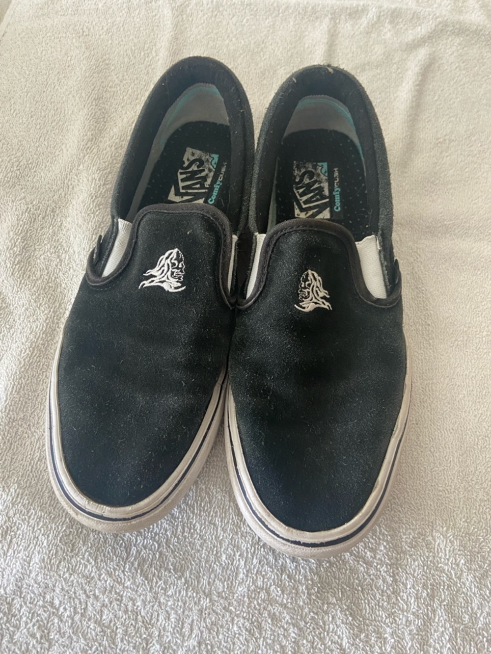 Vans Black Slip-On Loafers with White Embroidered Flame